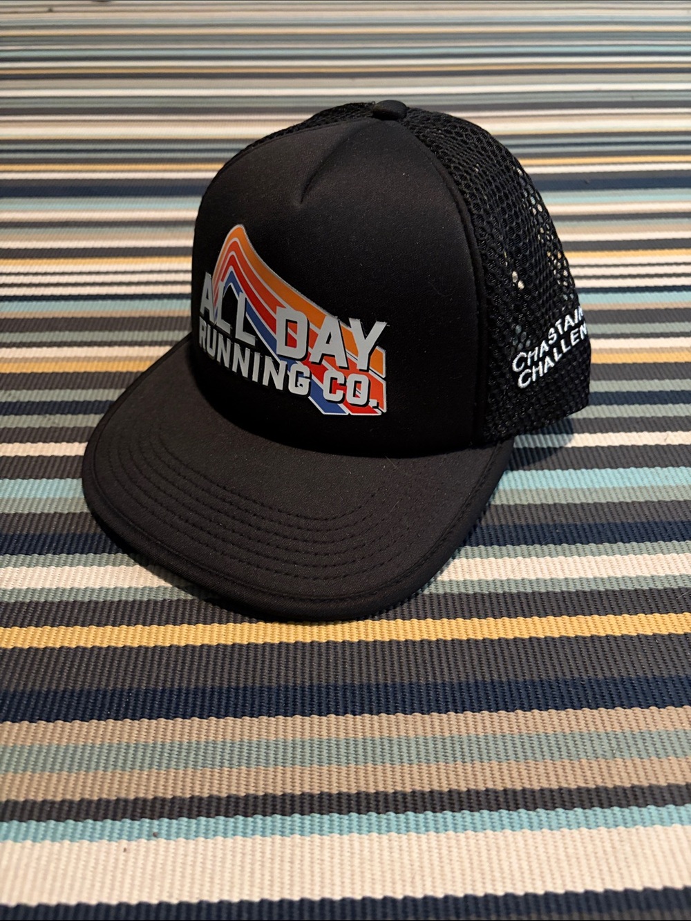 Black Trucker Cap with All Day Running Co. Logo